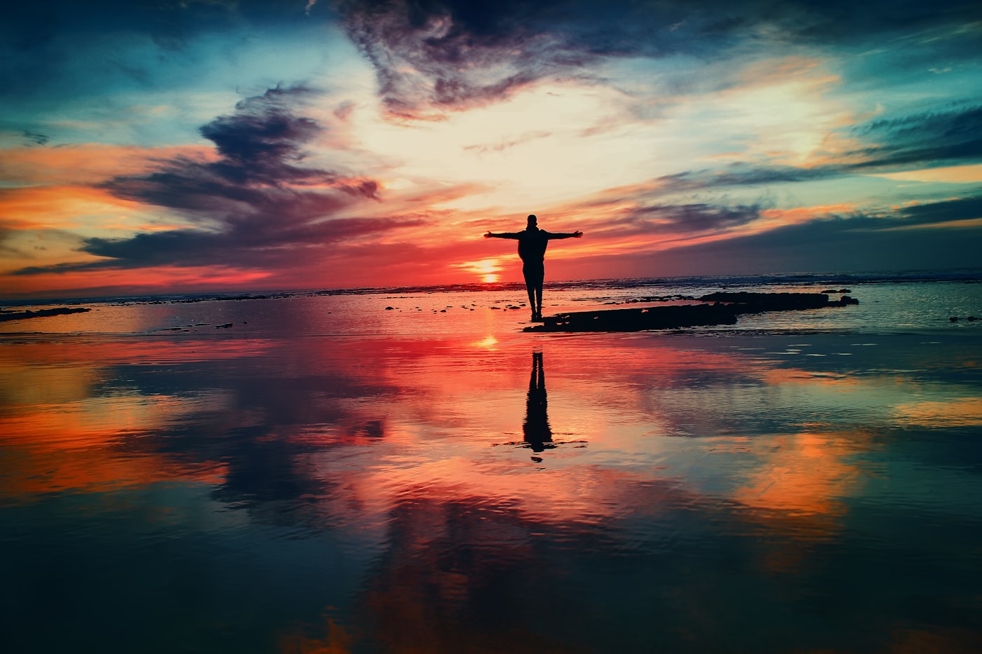 Person facing a sunrise